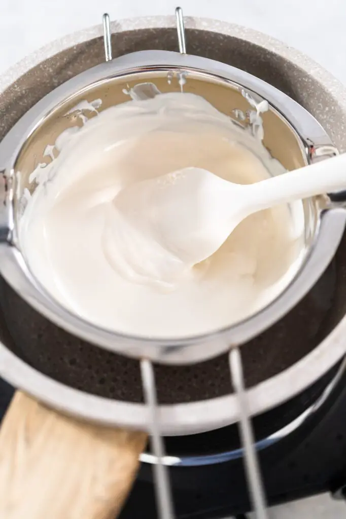 Soothe Your Skin Naturally: Homemade Bug Bite Balm 4 Double boiler beeswax bug bite balm, how to make bug bite balm, how to make beeswax bug bite balm