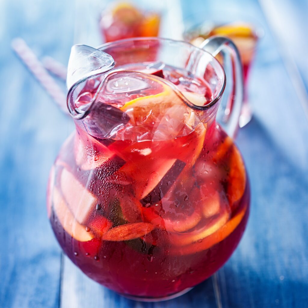 Ultimate 4th of July Menu: Festive Recipes for the Perfect Patriotic Celebration 12 sangria pitcher with fruits on table top 2023 11 27 04 52 53 utc Large