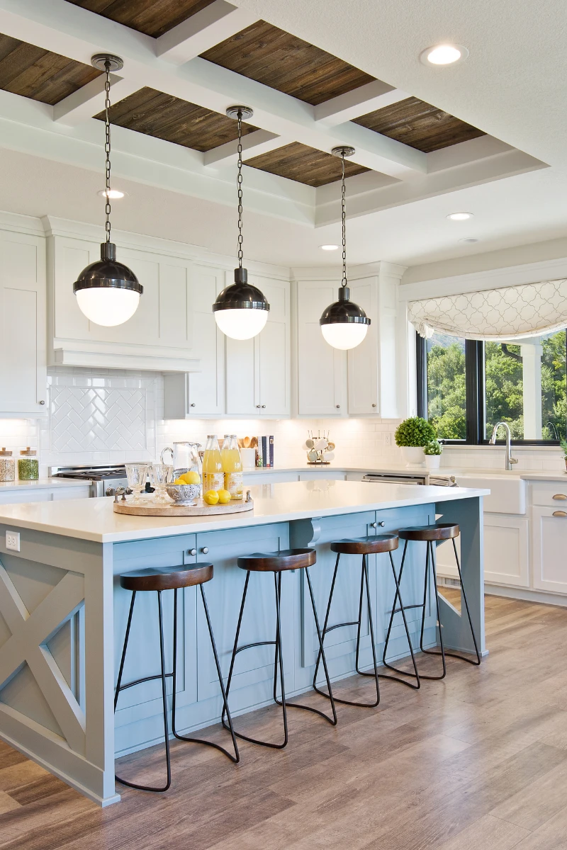 Bright, modern kitchen with a clean, organized island and minimal clutter, showcasing a functional space designed for busy, lived-in kitchens.